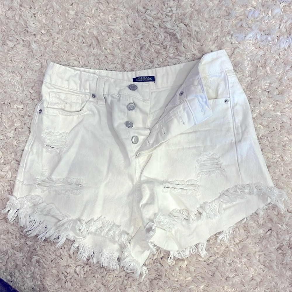White denim shorts, slightly ripped, perfect condition